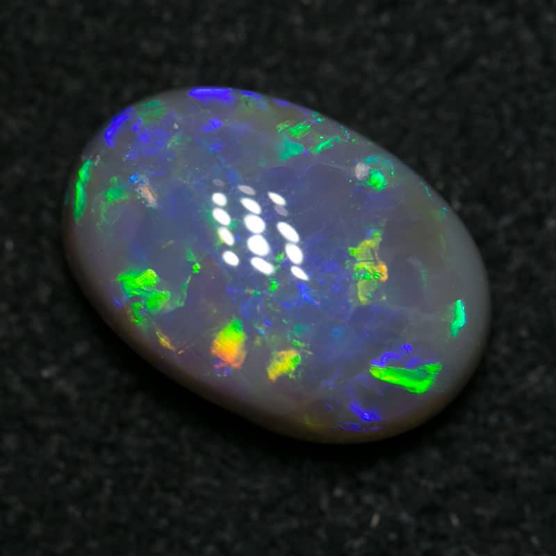 1.38 ct dark opal 9x6x4mm