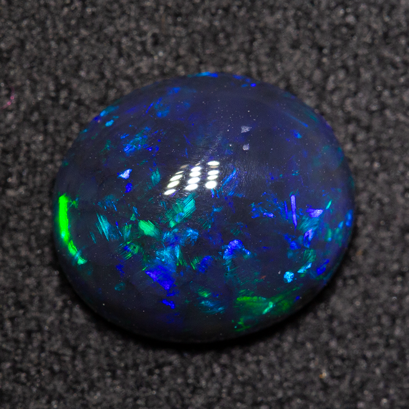 1.39 ct double-sided black opal 8.8x7.7x3.4mm