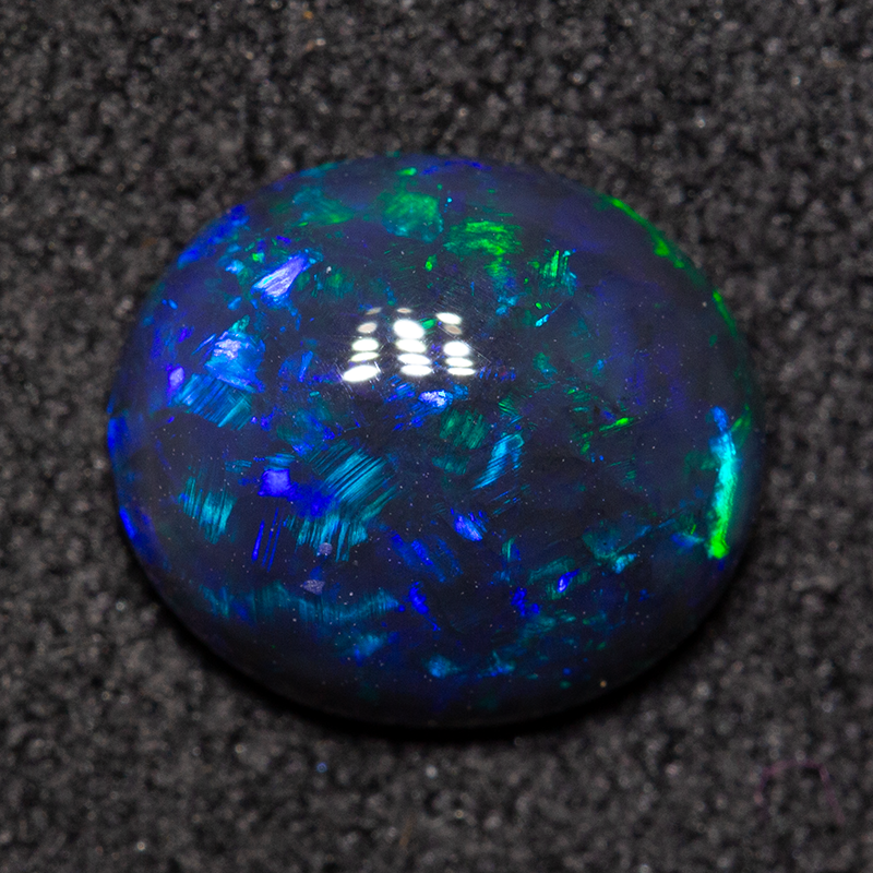 1.39 ct double-sided black opal 8.8x7.7x3.4mm