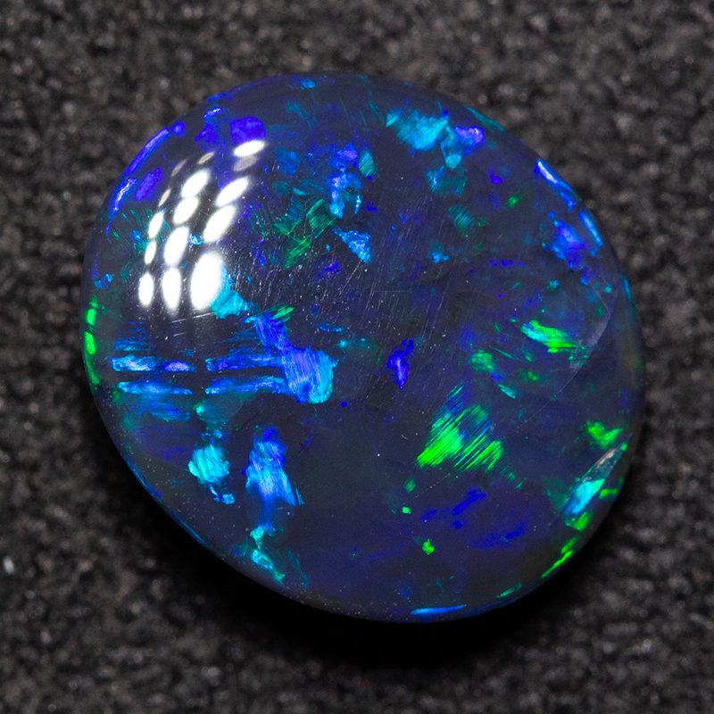 1.39 ct double-sided black opal 8.8x7.7x3.4mm