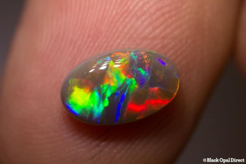 1.42 ct semi black opal 10.5x6x3mm