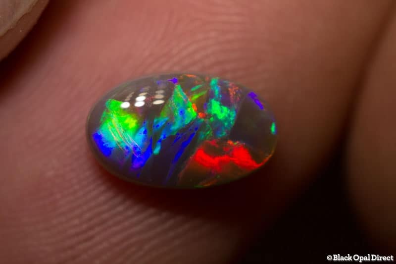 1.42 ct semi black opal 10.5x6x3mm