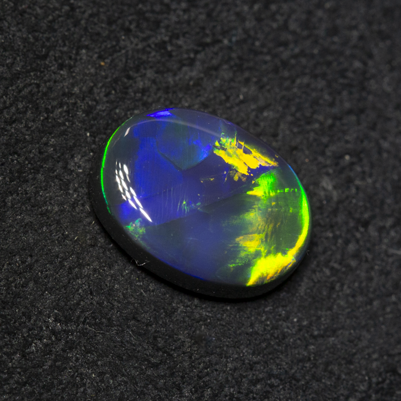 1.44 ct black opal gem 9.2x6.8x3.1mm