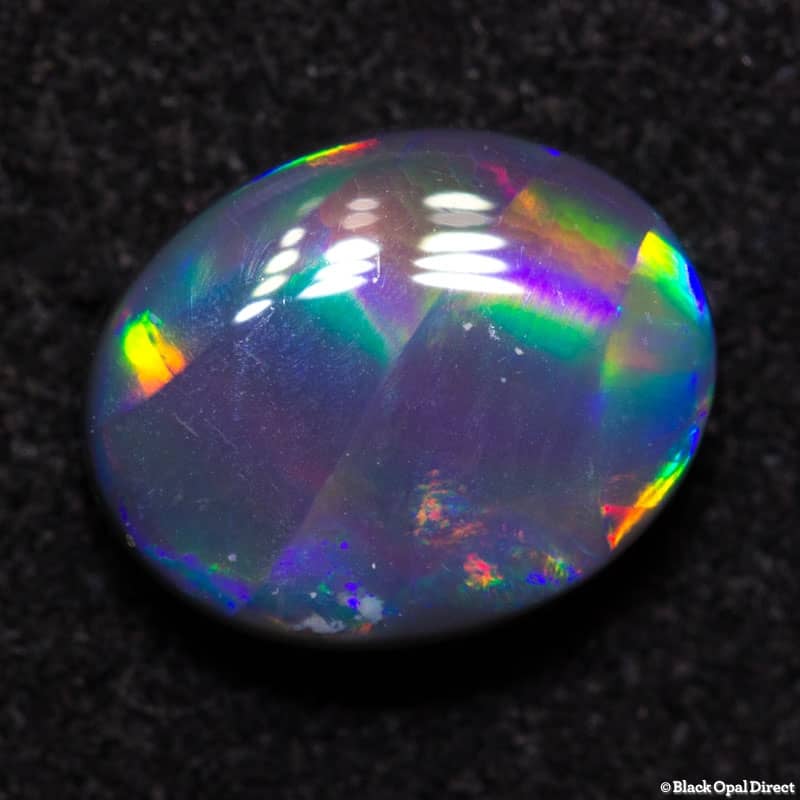 1.44 ct ribbon pattern black opal 9x7x3mm