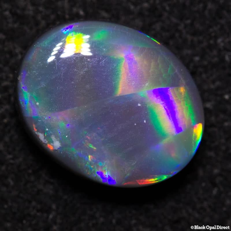 1.44 ct ribbon pattern black opal 9x7x3mm