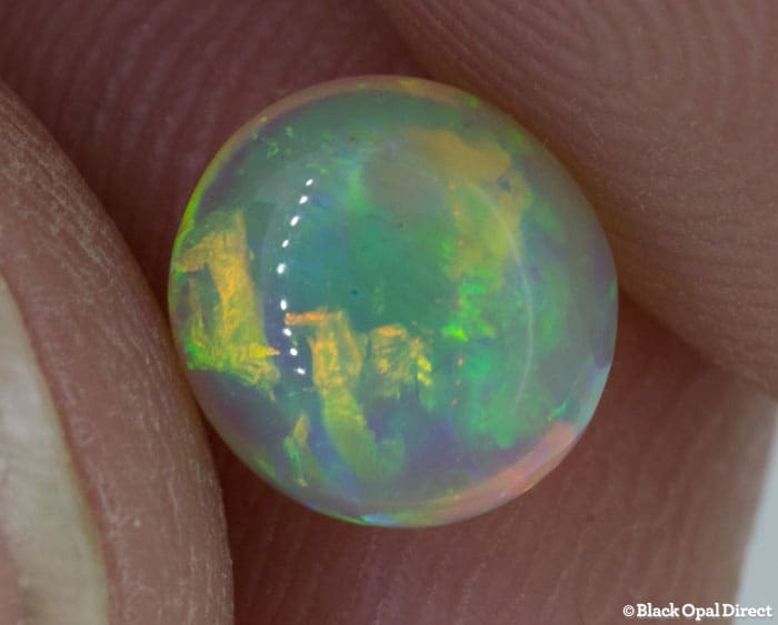1.46 ct double sided crystal opal 7x6.5x5mm