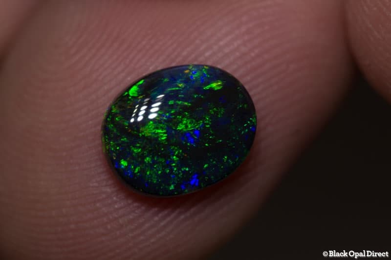 1.50 ct black opal 9.5x8x3mm