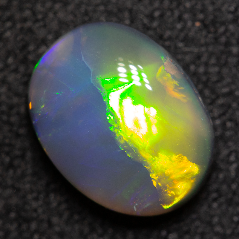 1.51 ct black opal 8.9x6.9x3.9mm