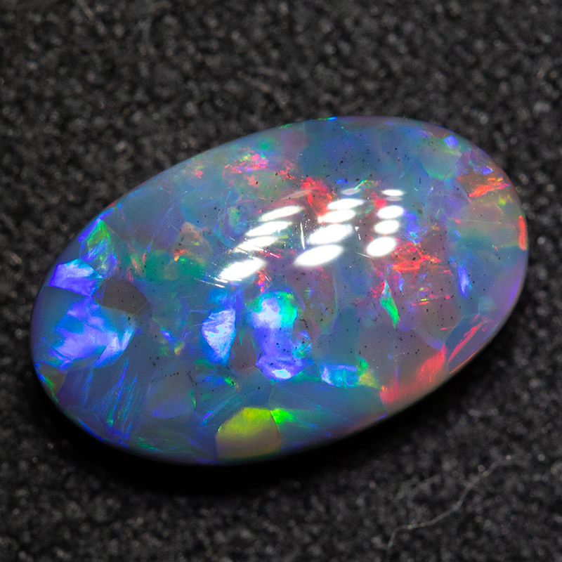 1.51 ct black opal 10.3x6.4x3.7mm