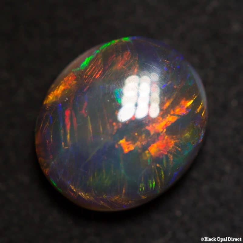 1.53 ct black opal 8.5x7.5x3.5mm