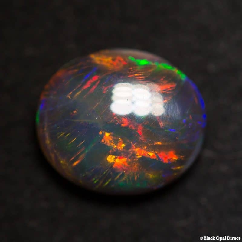 1.53 ct black opal 8.5x7.5x3.5mm