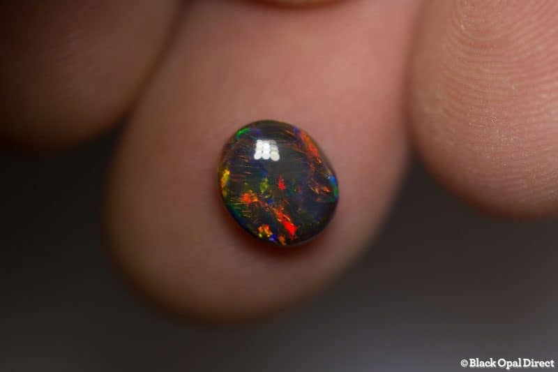 1.53 ct black opal 8.5x7.5x3.5mm