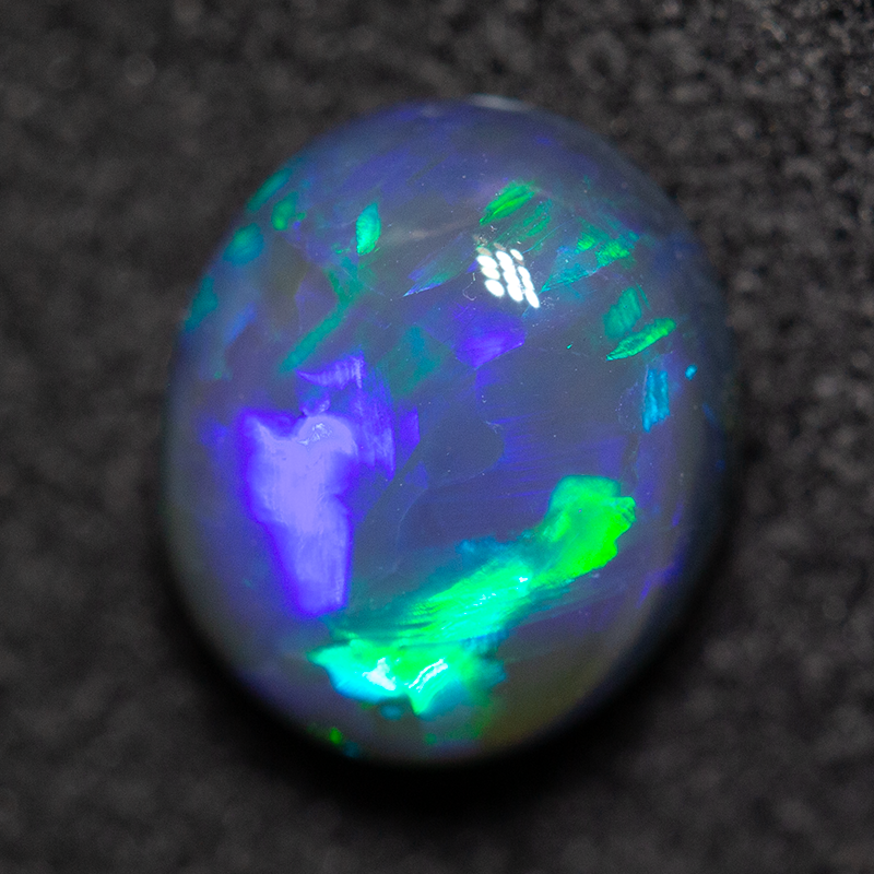 1.54 ct black opal 8x6.9x4.2mm