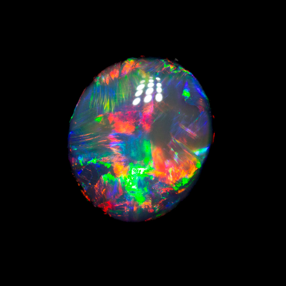 1.54 ct gem black opal 8.2x6.9x4.1mm