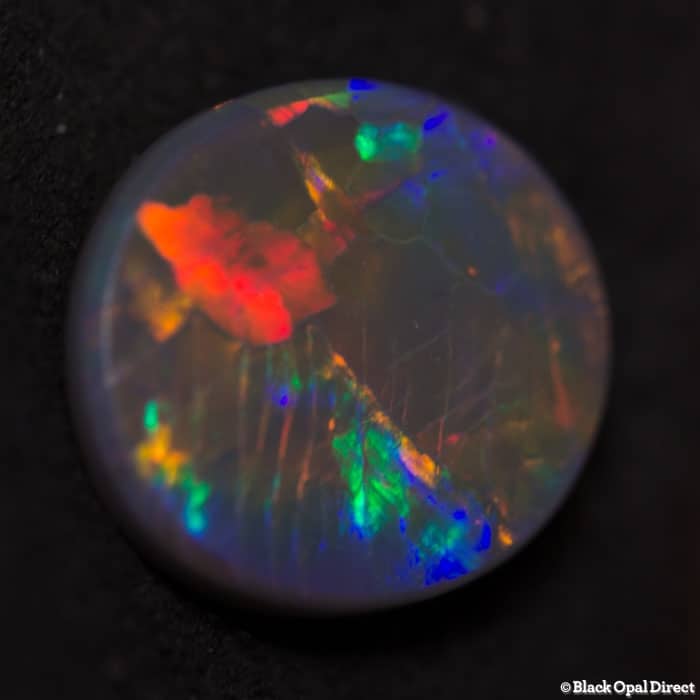 1.54 ct black opal 10x9x2.5mm