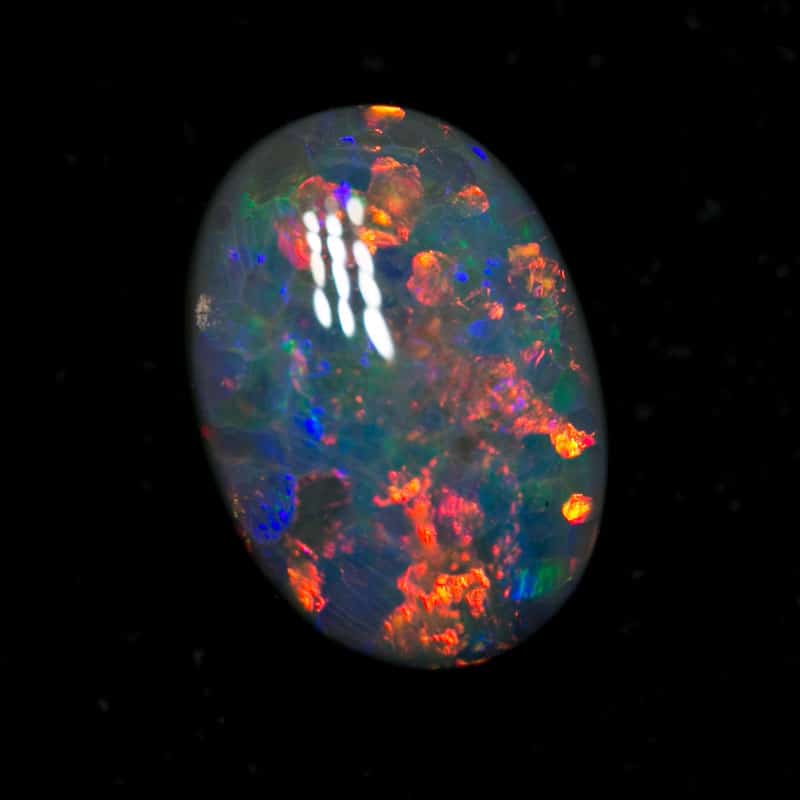 1.60 ct dark opal 9x7x3.5mm