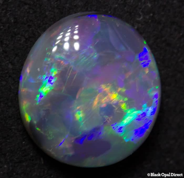 1.62 ct double sided black opal 9x8.5x3mm