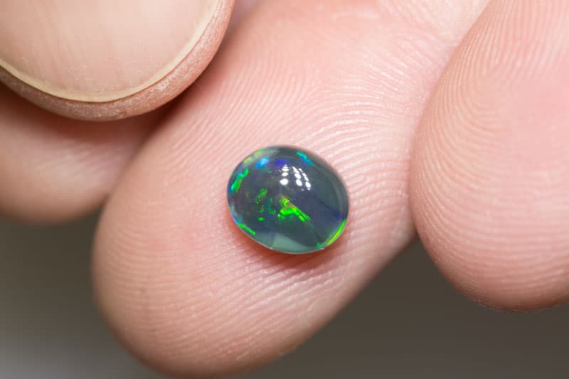 1.62 ct black opal 8x7x4.5mm