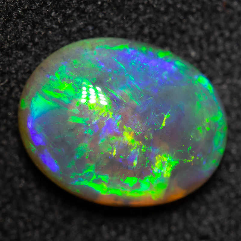 1.63 ct black crystal opal 9.3x7.4x3.9mm