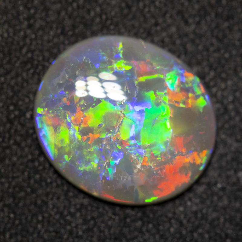 1.66 ct dark opal 11.3x9.9x2.3mm