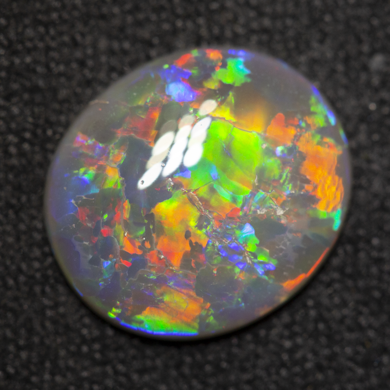 1.66 ct dark opal 11.3x9.9x2.3mm