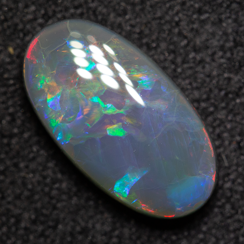 1.66 ct black opal 11.4x6.2x3.2mm
