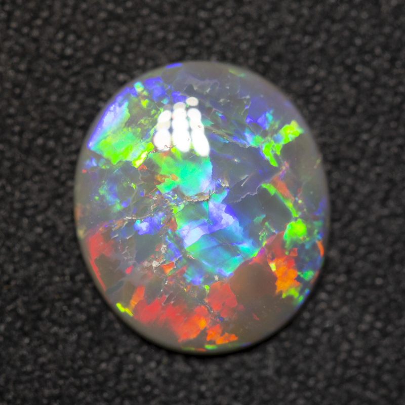1.66 ct dark opal 11.3x9.9x2.3mm