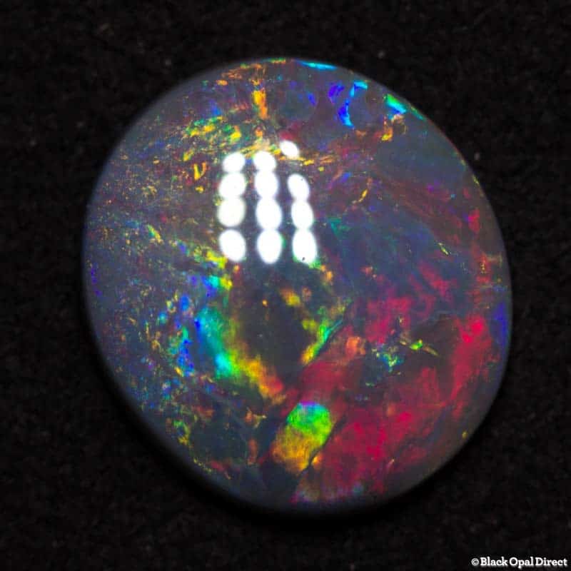 1.67 ct semi black opal 10x9x2.5mm DAVE C