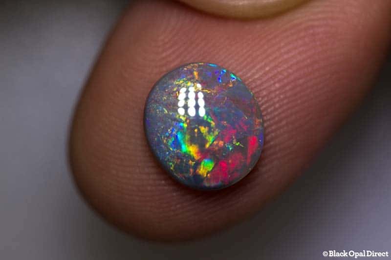 1.67 ct semi black opal 10x9x2.5mm DAVE C