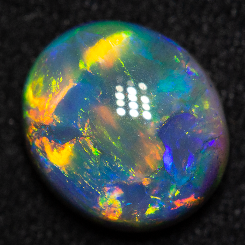 1.70 ct black opal gem 9x8x4mm