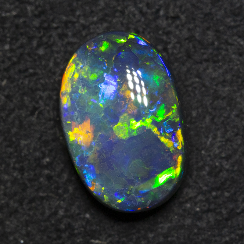 1.71 ct black opal 6.4x9.4x4.4mm