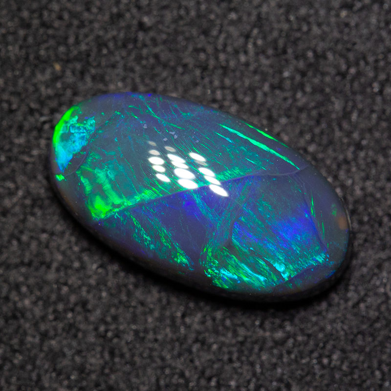 1.71 ct black opal 11.2x6.1x3.7mm