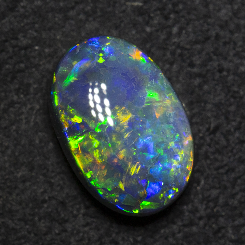 1.71 ct black opal 6.4x9.4x4.4mm