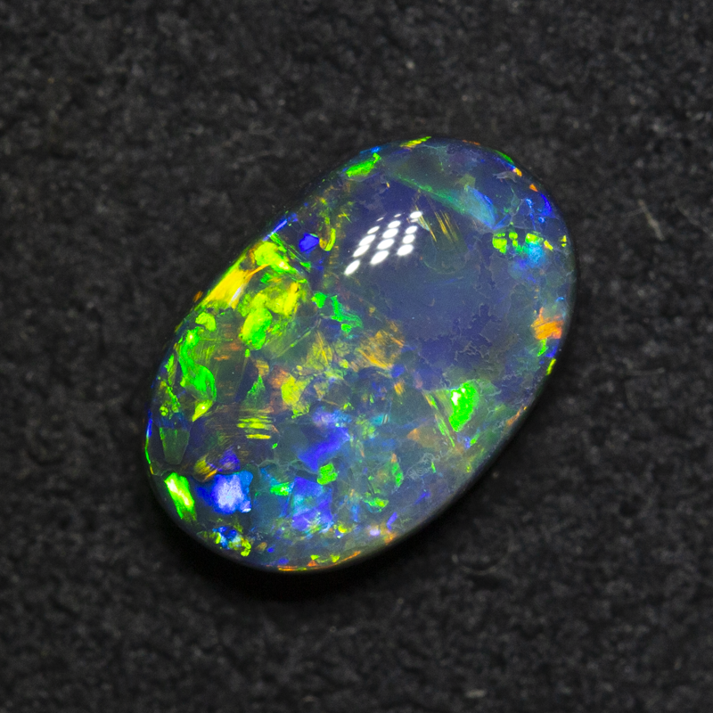 1.71 ct black opal 6.4x9.4x4.4mm