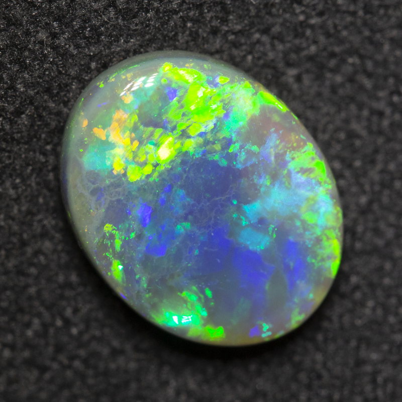 1.72 ct black opal 10.1x7.9x3.2mm
