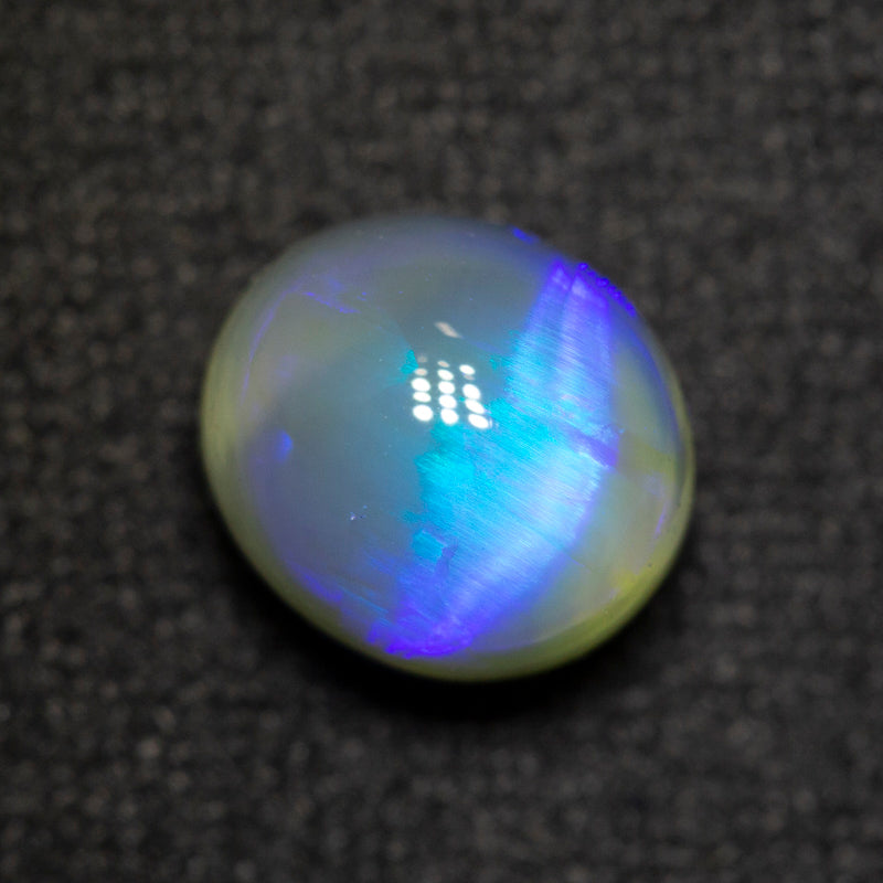1.74 ct dark opal 7.7x6.8x5.6mm