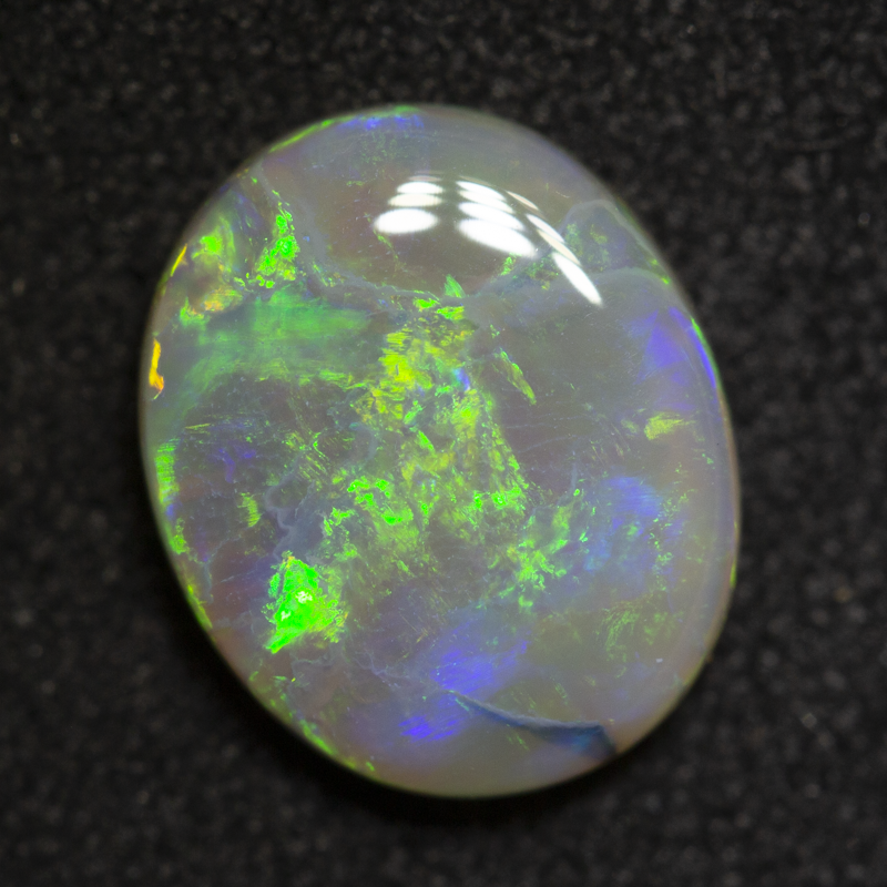 1.74 ct dark opal 9.9x8.1x2.9mm
