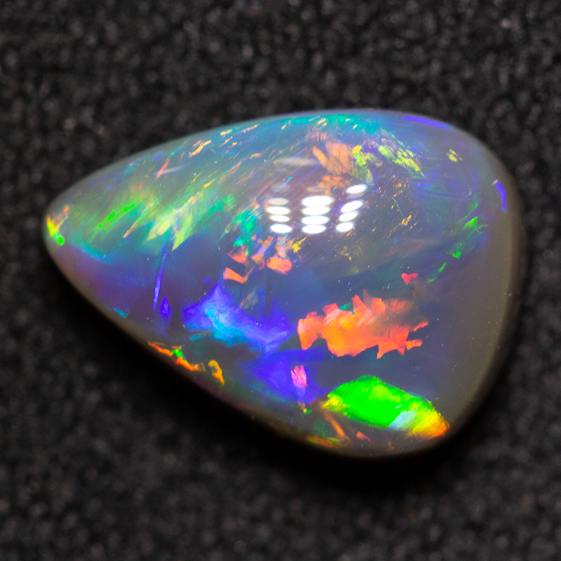 1.75 ct black opal 9.7x7.1x4.4mm