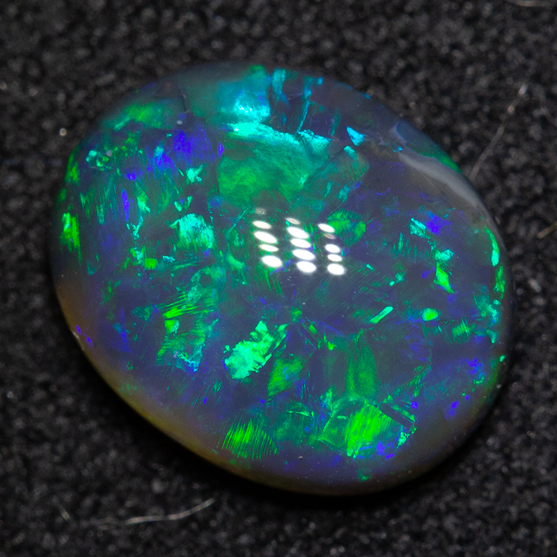1.76 ct black opal 9.5x7.5x3.5mm