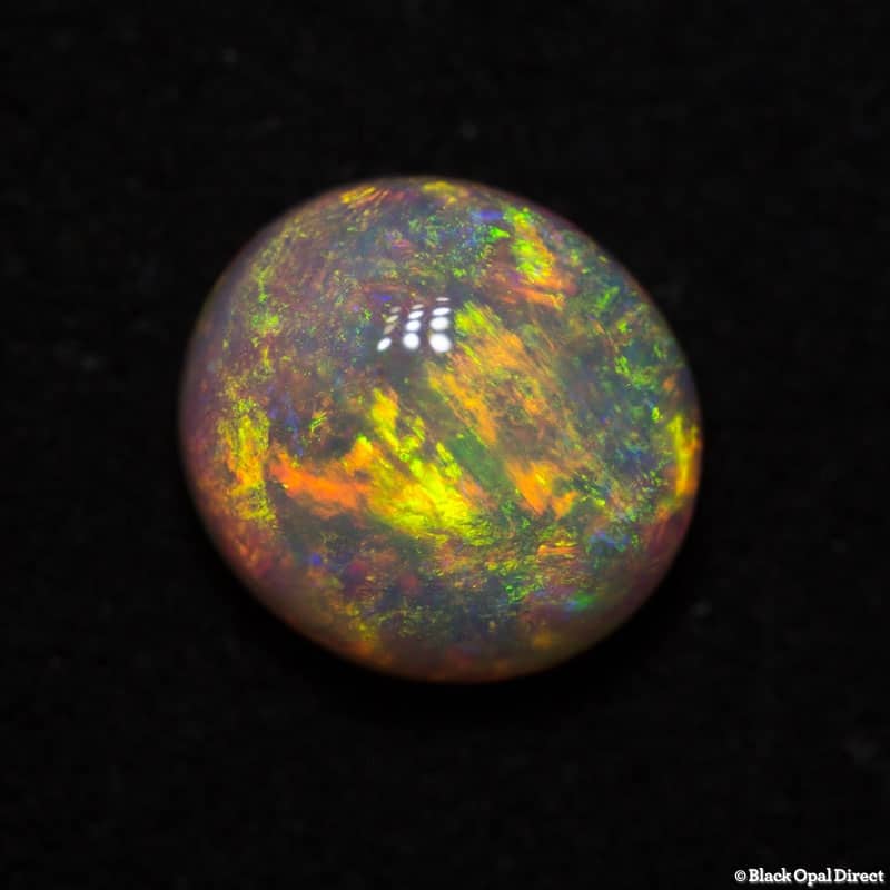 1.76 ct orange green crystal opal 8x7x4.5mm