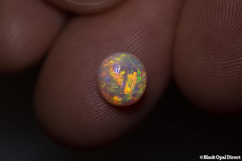 1.76 ct orange green crystal opal 8x7x4.5mm