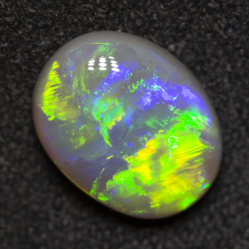 1.77 ct dark opal 9.5x7.5x4mm