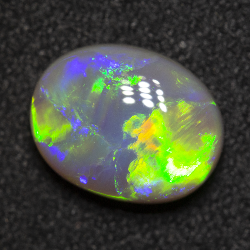 1.77 ct dark opal 9.5x7.5x4mm