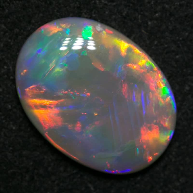 1.79 ct dark opal 11.5x8.5x2.5mm