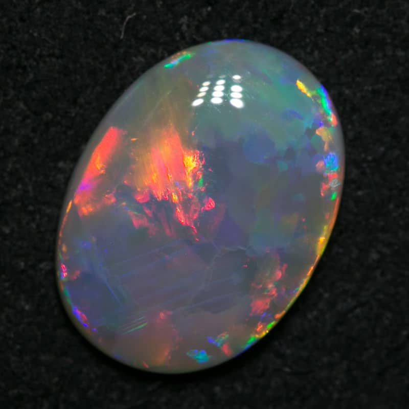 1.79 ct dark opal 11.5x8.5x2.5mm