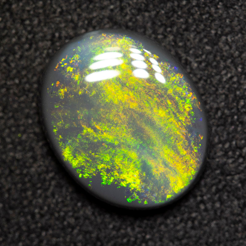 1.81 ct black opal 10.4x8.5x2.9mm