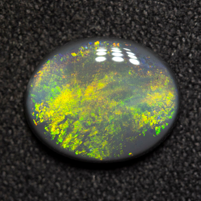 1.81 ct black opal 10.4x8.5x2.9mm