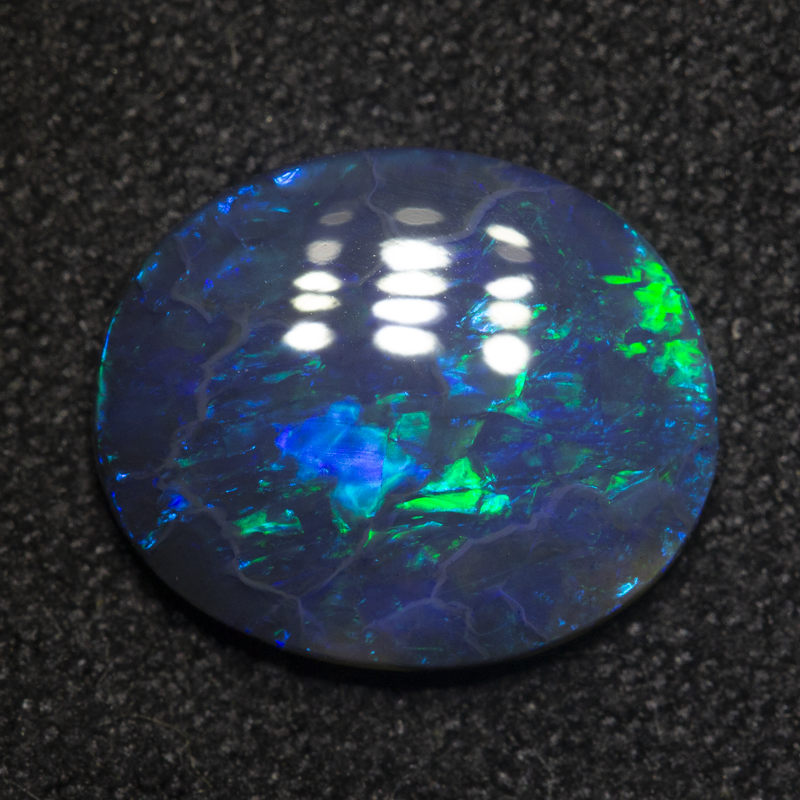 1.82 ct black opal 11.4x9.5x2.4mm
