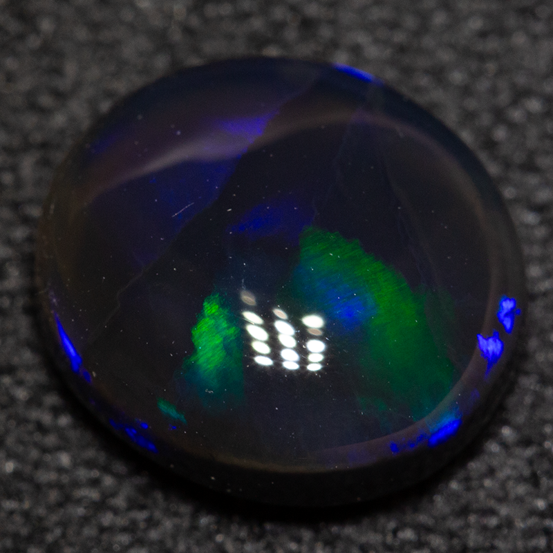 1.87 ct black opal 9x7.9x4.1mm