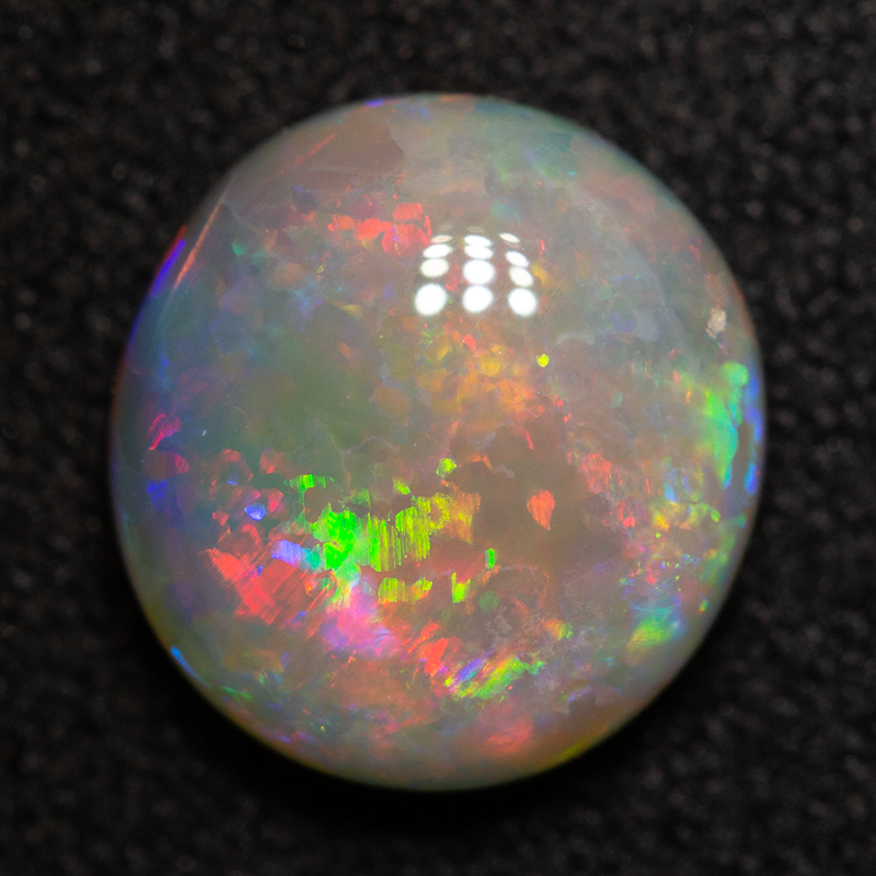 1.88 ct dark opal 8.9x8.5x3.8mm